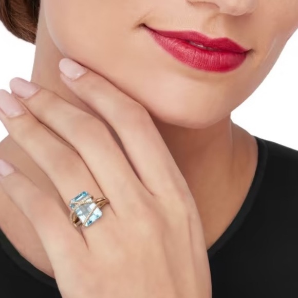 Sky Blue Topaz and Diamond Crisscross Ring in 14kt Yellow Gold. - Picture 2 of 8